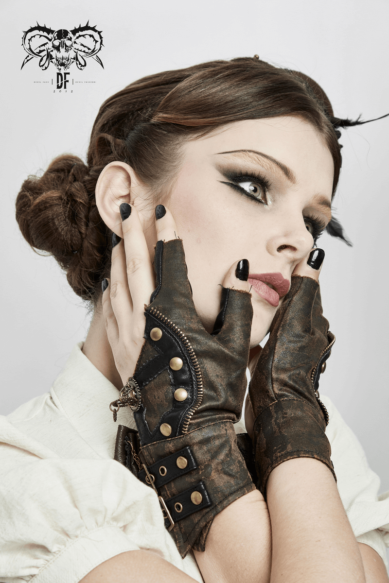 Women's steampunk leather gloves with rivets, showcasing a fashionable model against a light backdrop.