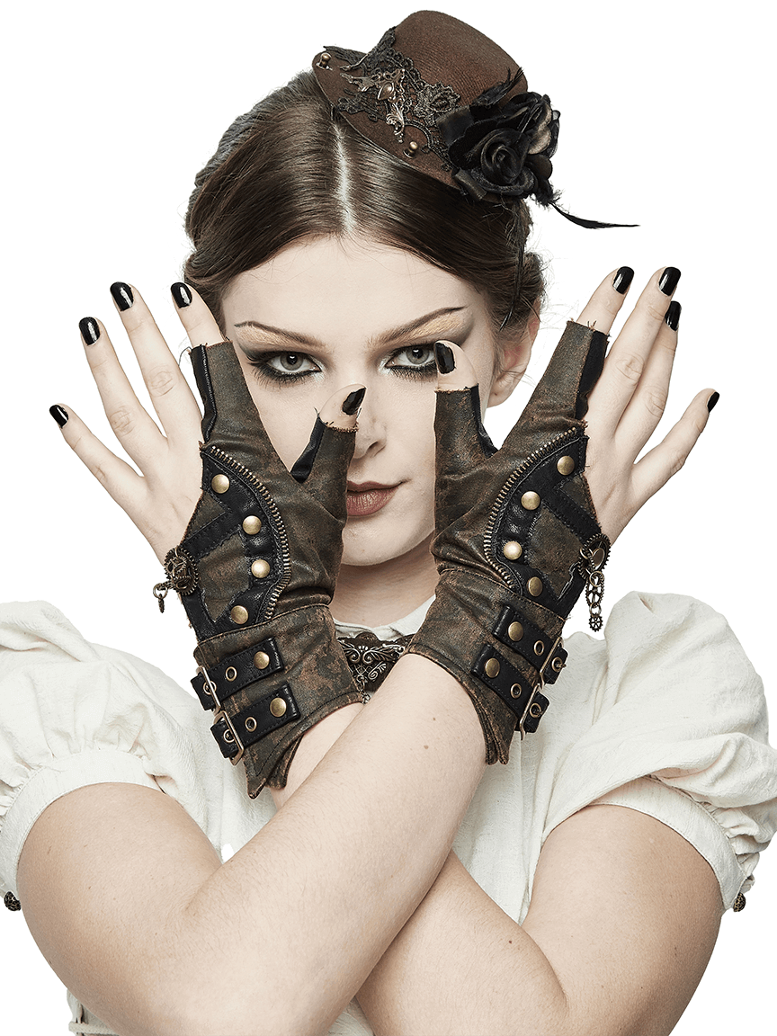 Steampunk women's brown leather gloves with rivets and zippers, worn by model, showcasing a fashionable accessory.