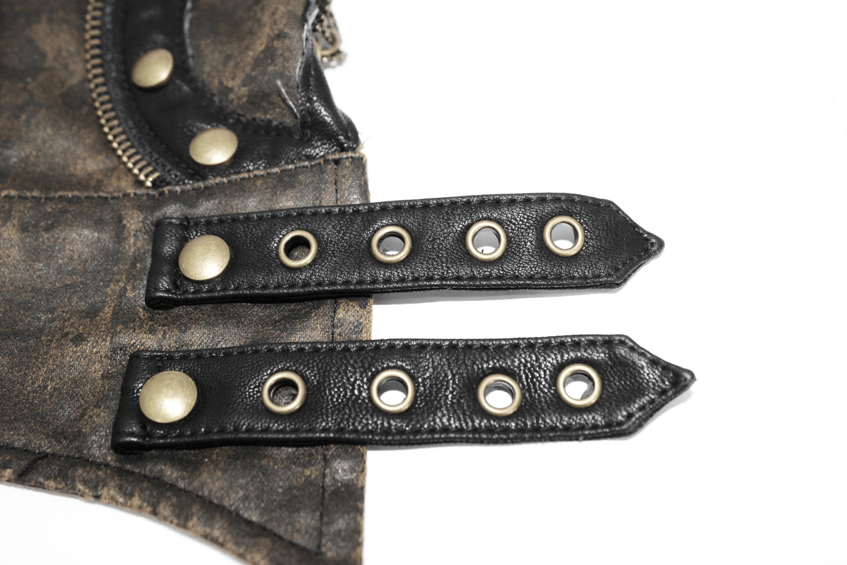 Close-up of steampunk leather gloves showing rivets and black leather straps for a stylish accessory look.