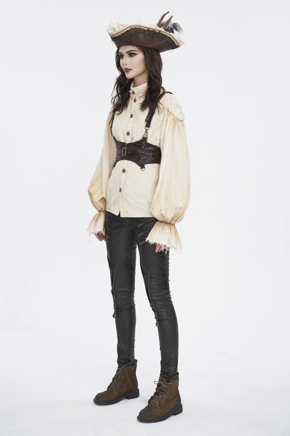 Steampunk style model wearing a leather harness, pirate hat, and gothic outfit for a dramatic look.