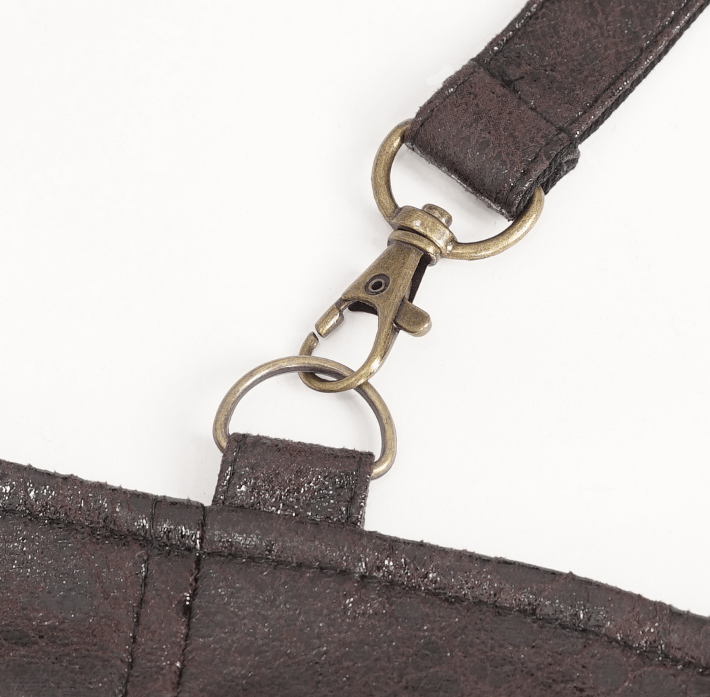 Close-up of steampunk leather harness buckle and strap detail, showcasing quality craftsmanship and adjustable features.
