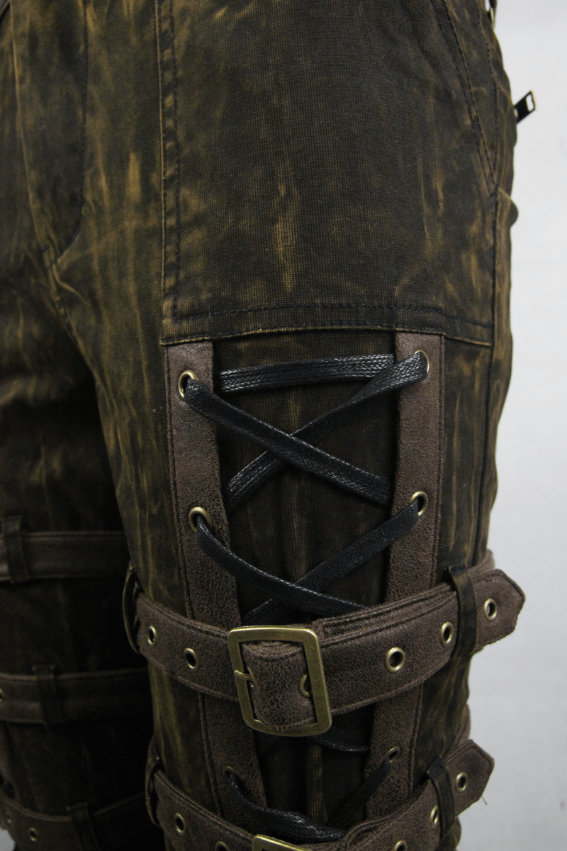 Close-up of steampunk brown cotton trousers with unique buckle and lace detailing for a stylish gothic look.