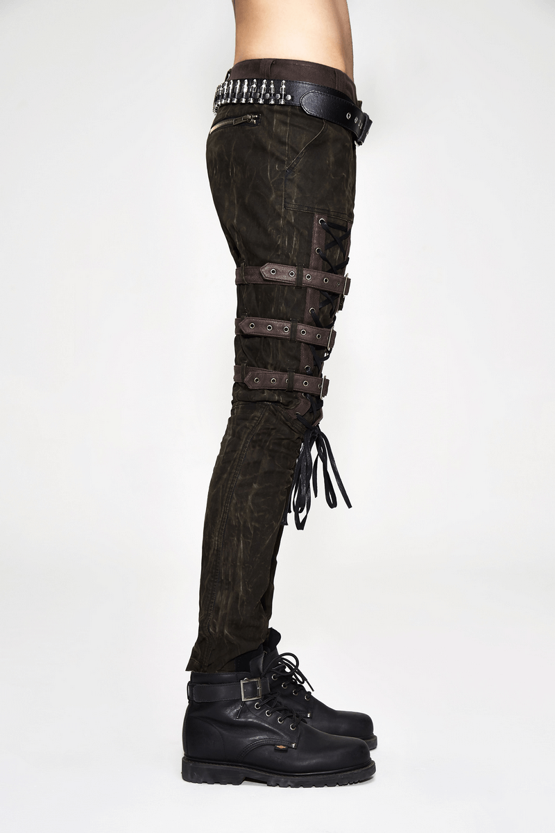 Side view of steampunk men's brown cotton trousers with decorative buckles and laces, paired with black combat boots.