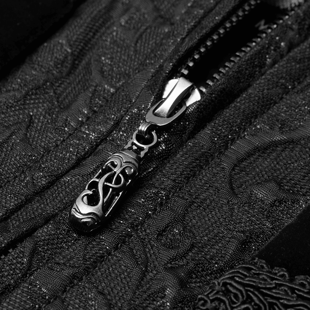 Close-up of ornate zipper detail on black embroidered steampunk waistcoat for men