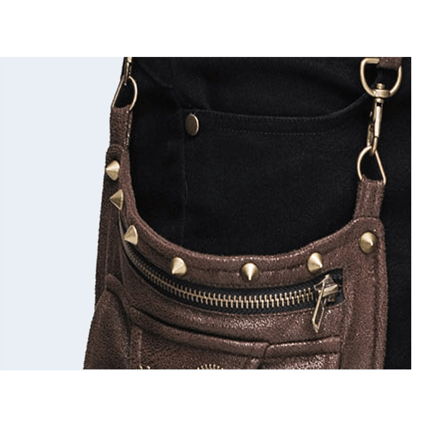 Close-up of brown detachable side pocket with studs and zipper on steampunk black jeans.