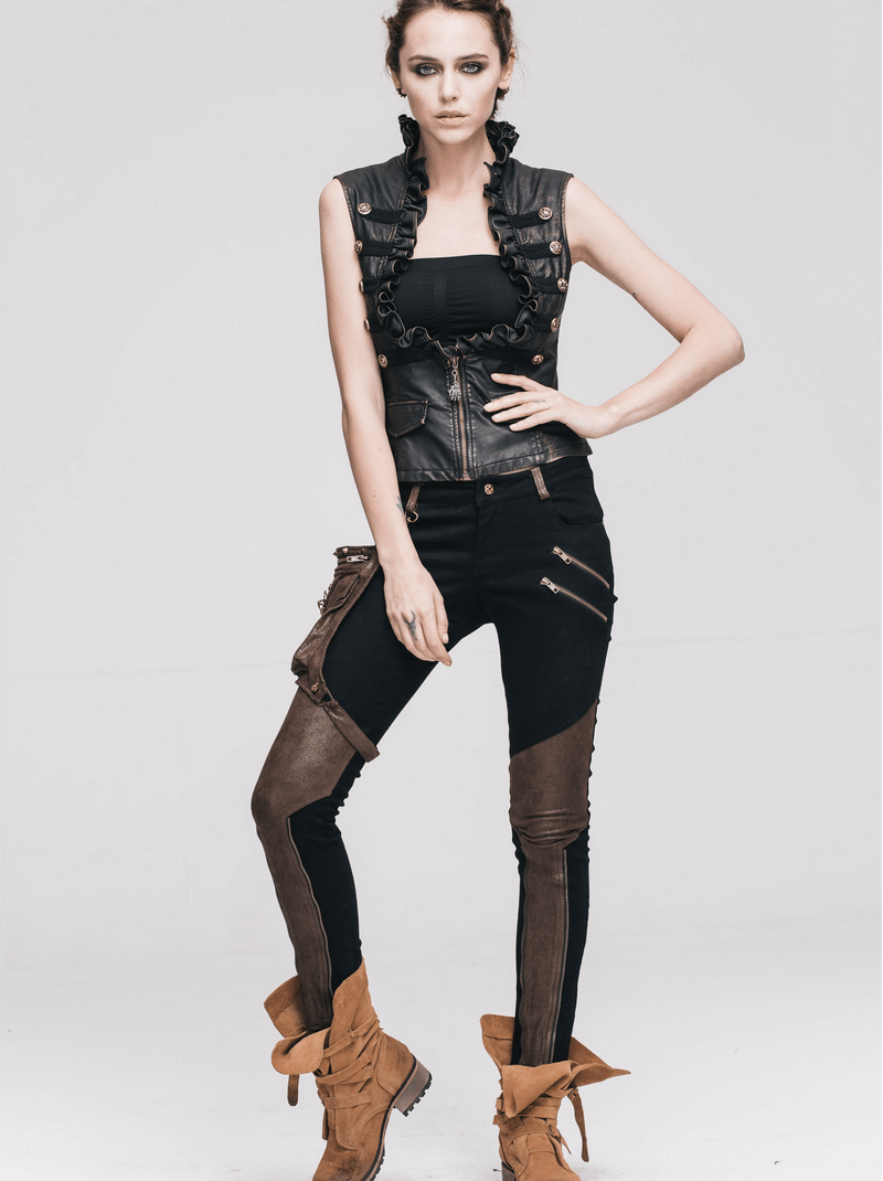 Fashionable woman in steampunk-style black pants with leather accents and a stylish vest, showcasing trendy lifestyle.