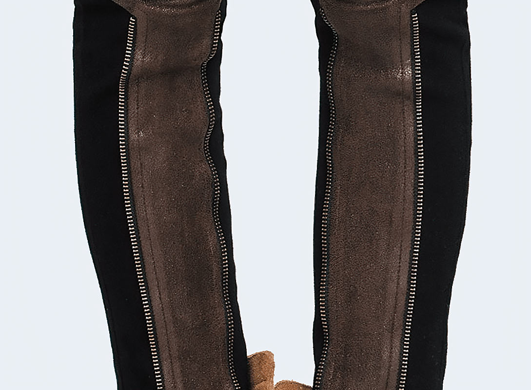 Steampunk women's pants with leather pocket and stretchy design, perfect for motorcycle enthusiasts.