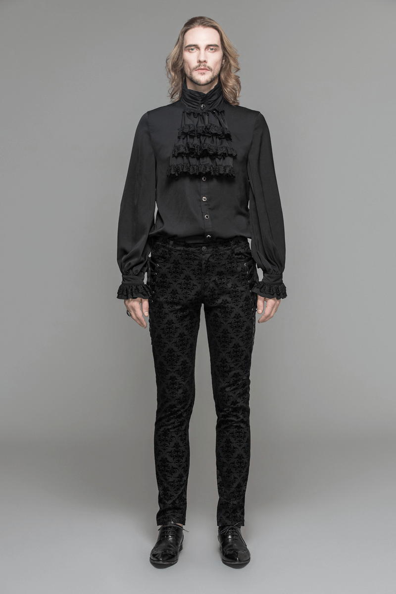 Men wearing gothic black slim pants with lace sides, paired with a stylish black ruffled shirt, showcasing elegant design.