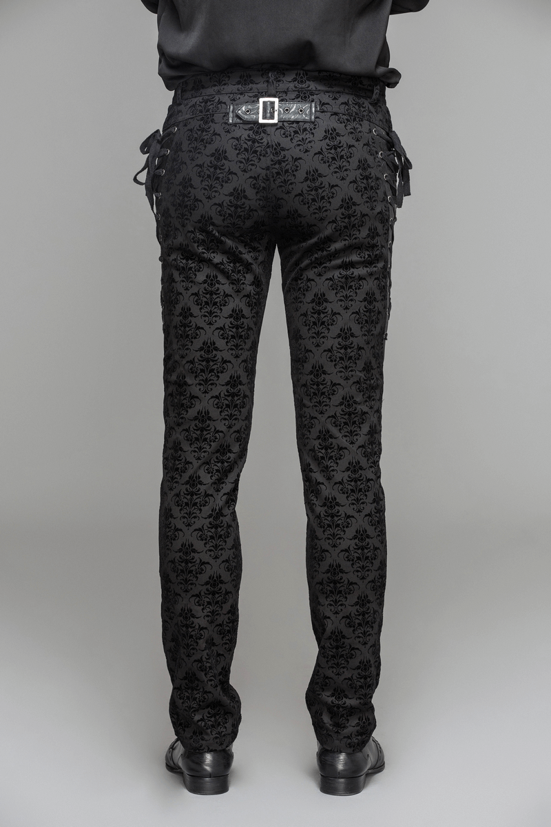 Back view of men's gothic black slim pants with lace-up sides and intricate vintage pattern.