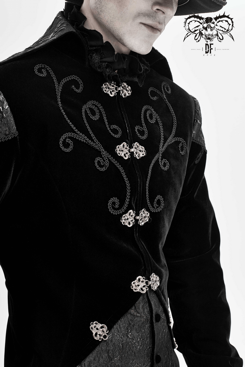 Close-up of a men's black velvet steampunk coat featuring elegant silver buttons and intricate embroidery design.