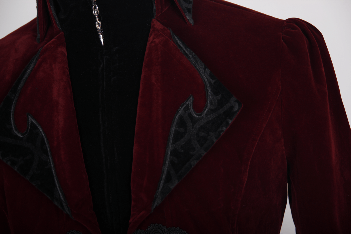 Close-up of a burgundy velvet steampunk coat showcasing elegant collar and vintage design details.