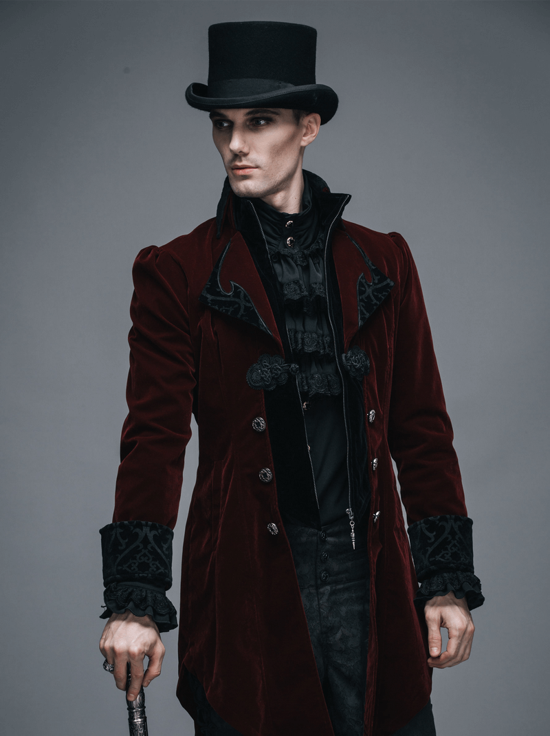 Stylish male model wearing a burgundy velvet steampunk coat with top hat and vintage details.