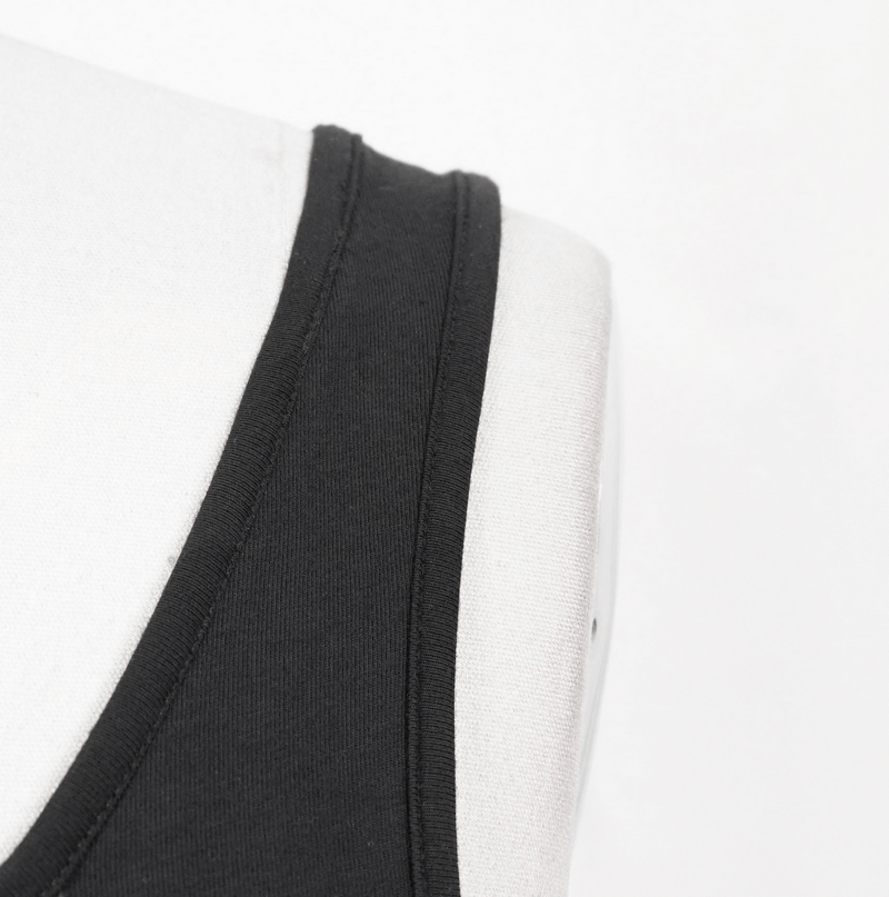 Close-up of a stylish black steampunk tank top for women, highlighting its sleek design and trendy detailing.