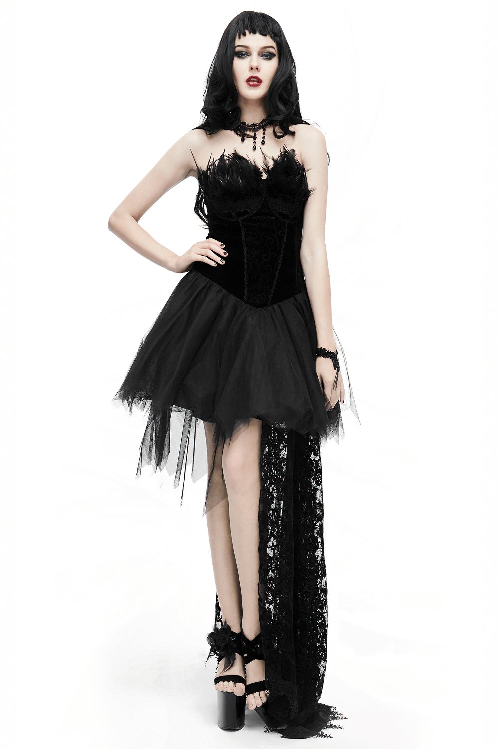 Stylish women's black strapless dress with lace train and feather details, perfect for gothic or steampunk fashion.