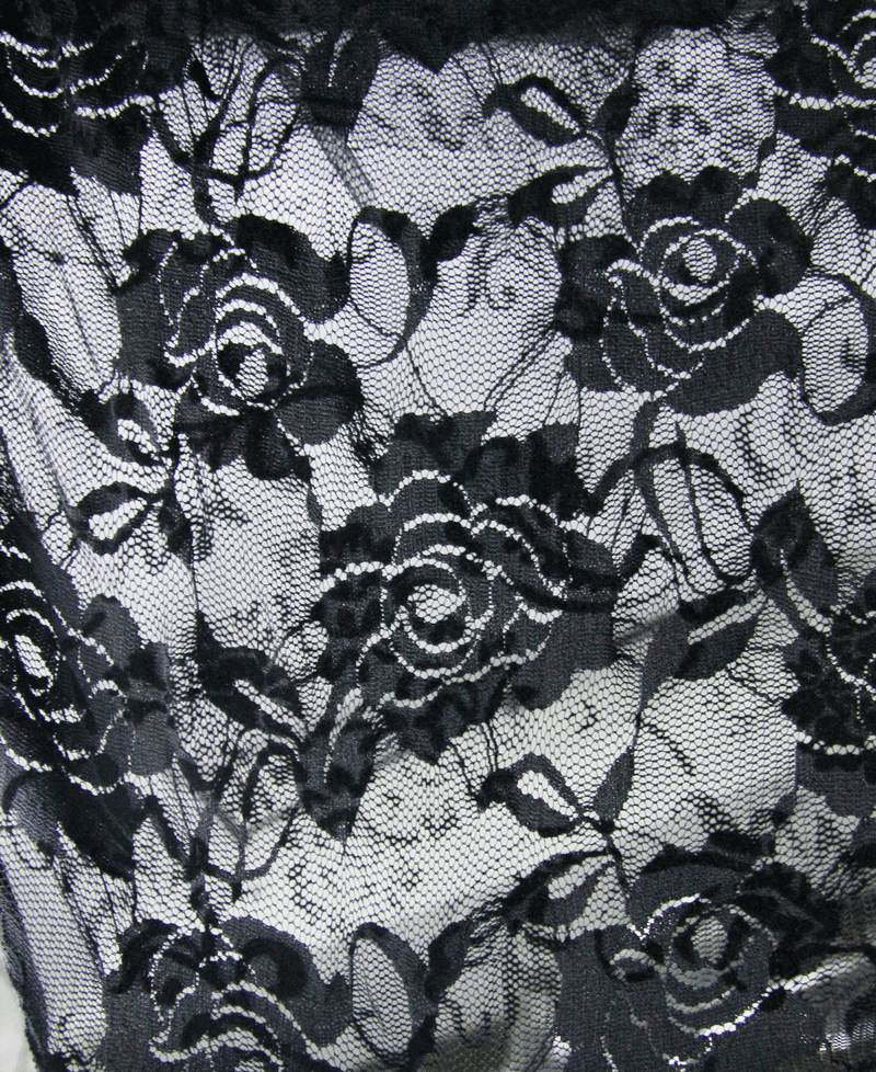 Elegant black lace with floral pattern, ideal for steampunk fashion and accentuating dresses.