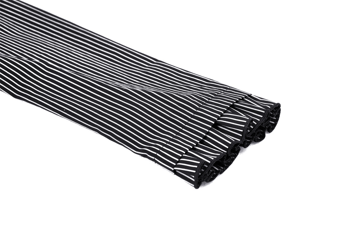 Close-up of ruffled sleeves featuring stylish black and white pinstripes, part of a chic steampunk dress.