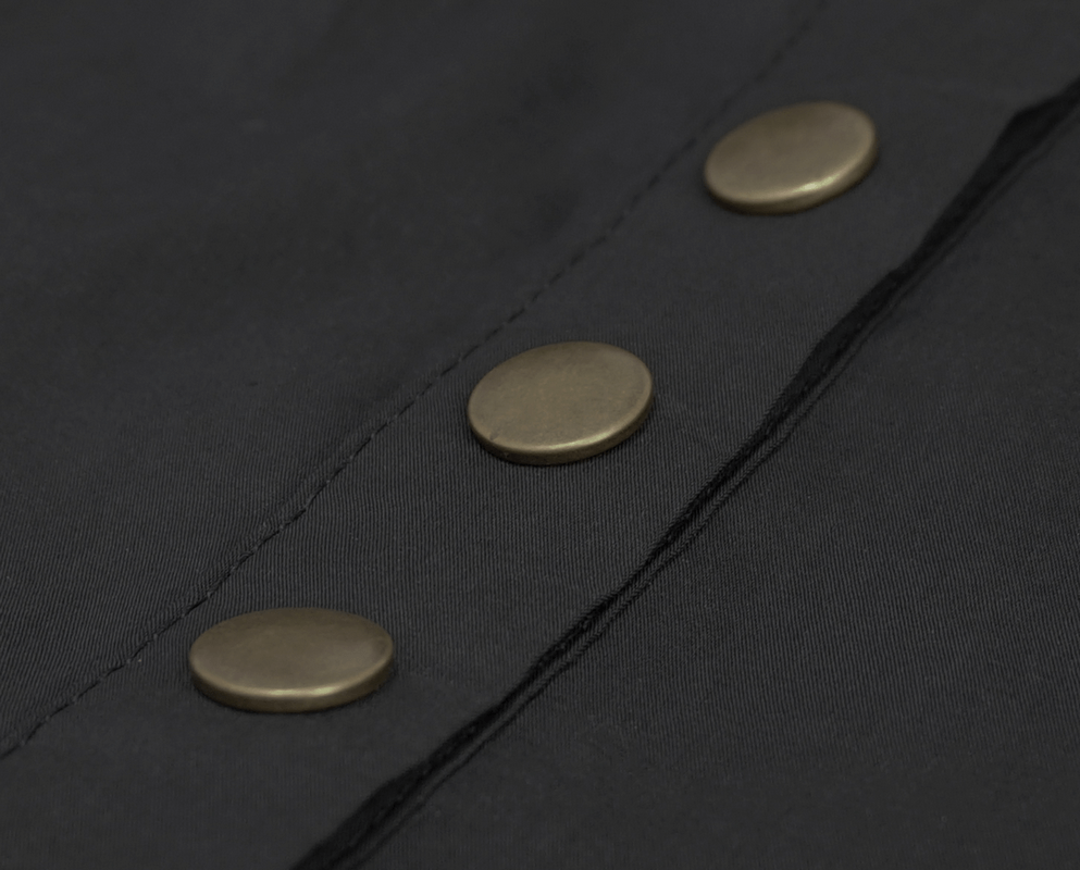 Close-up of bronze buttons on a stylish steampunk women's shirt featuring a vintage design.