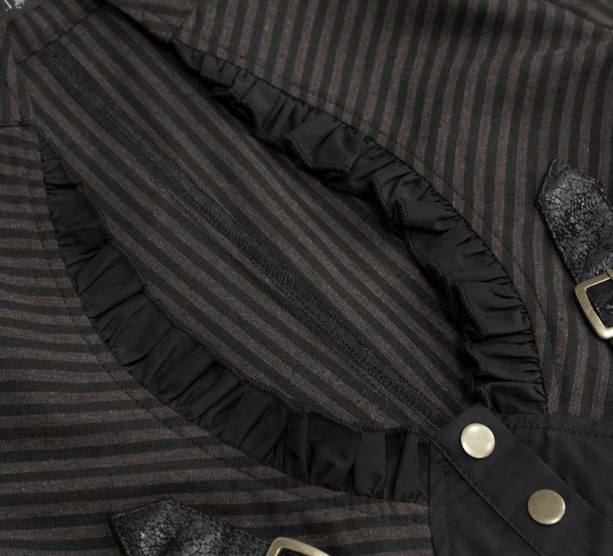 Close-up of a steampunk women's brown blouse with striped fabric and decorative buckle belts.