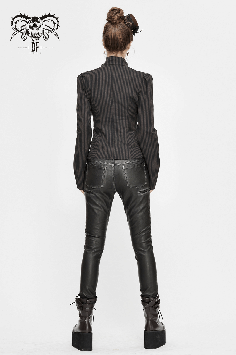 Back view of a woman in a steampunk striped long sleeves shirt, paired with black leather pants and stylish platform boots.