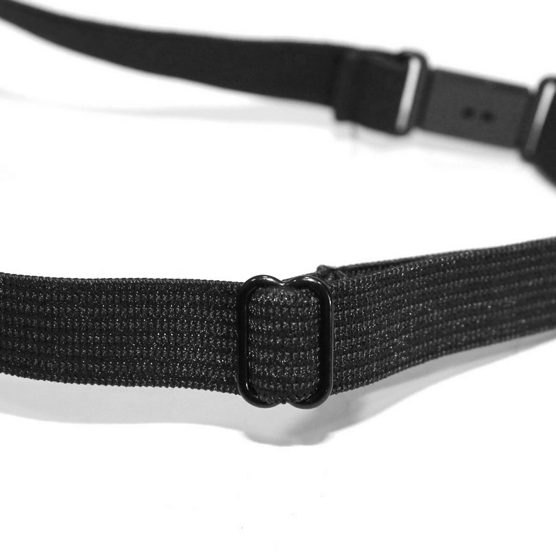 Close-up of a black adjustable strap with a sliding buckle, perfect for various accessories and outfits.