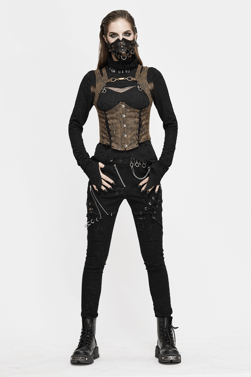 Stylish woman in a steampunk brown vest with rivets, black pants, and mask, showcasing edgy fashion.