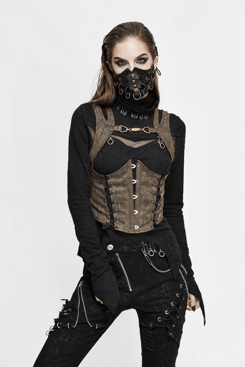 Steampunk women's brown PU leather vest with rivets and lace-up back, styled with black layers and accessories.