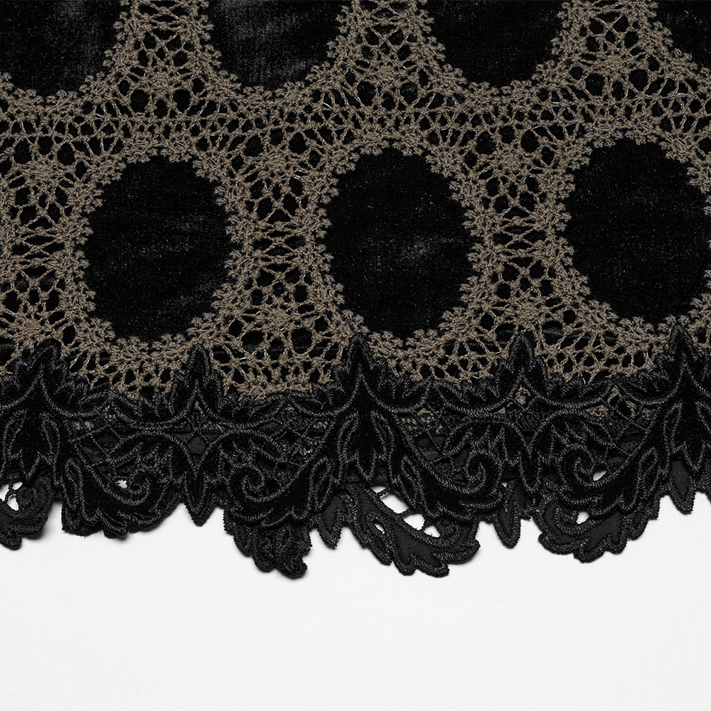 Close-up of elegant black-brown lace trim on velvet fabric, showcasing intricate gothic details and textures.