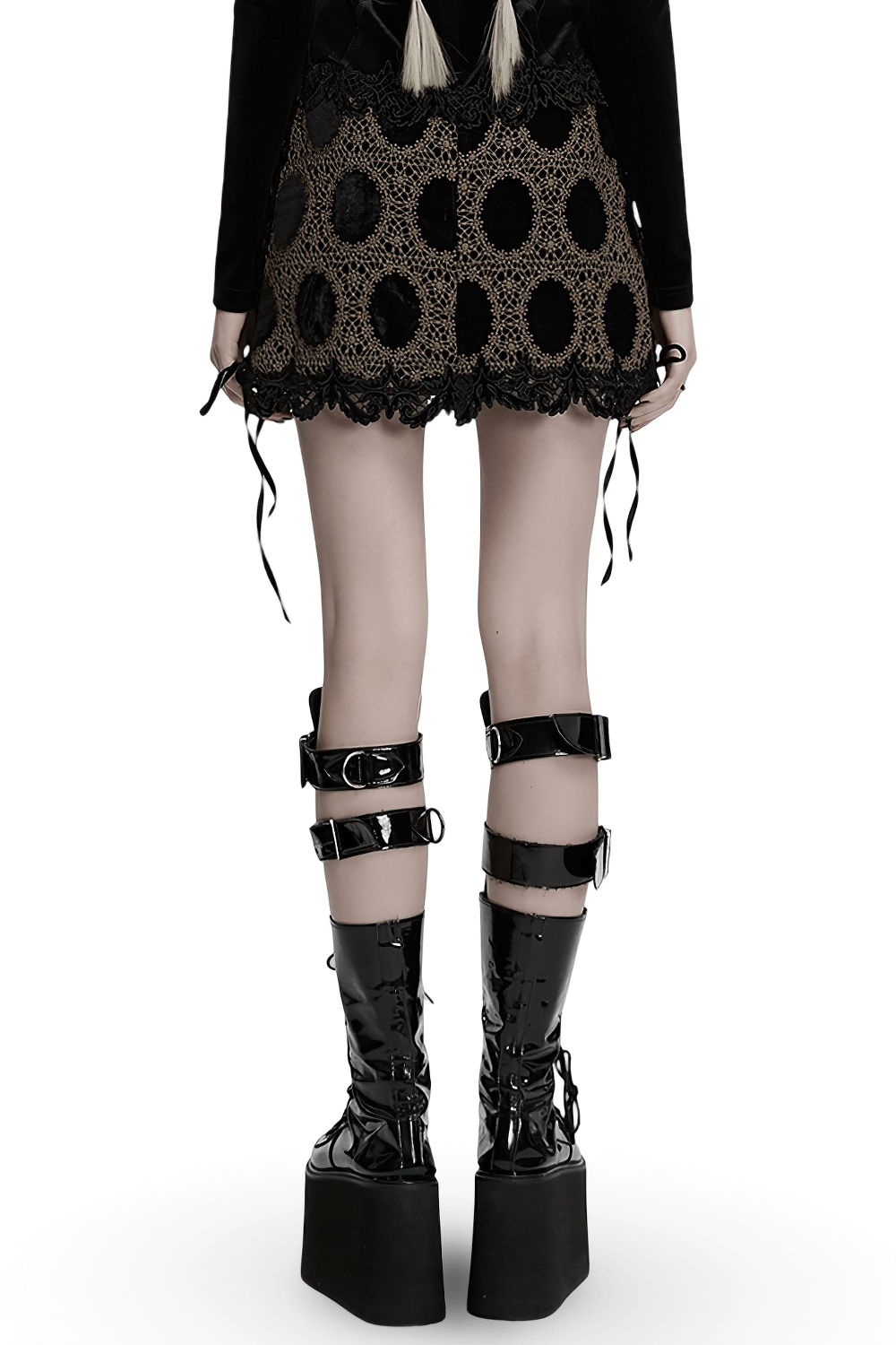 Back view of a stylish black-brown lace velvet gothic mini skirt paired with edgy platform boots.
