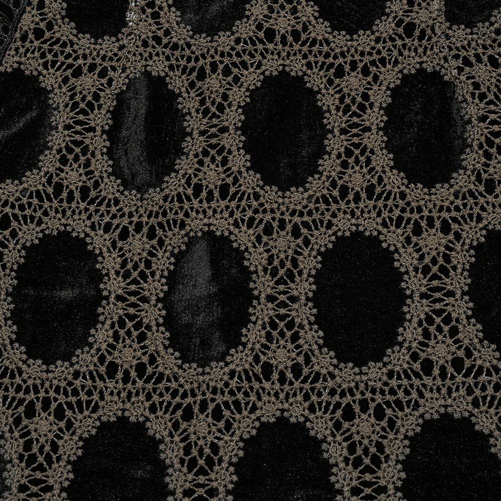 Close-up of black and brown lace pattern on velvet, perfect for a gothic mini skirt design.