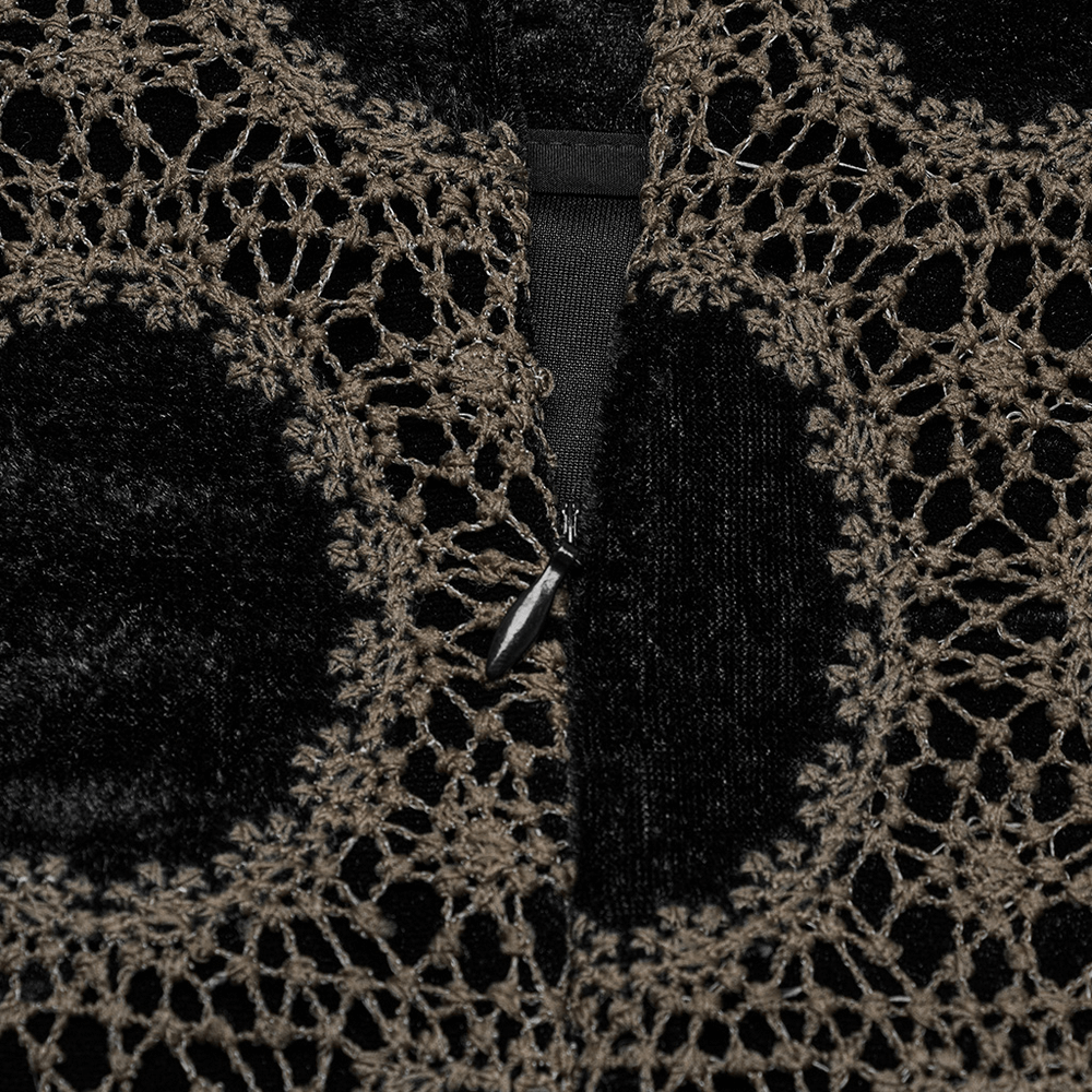 Close-up of black-brown lace detail on a velvet gothic mini skirt, showcasing intricate pattern and texture.