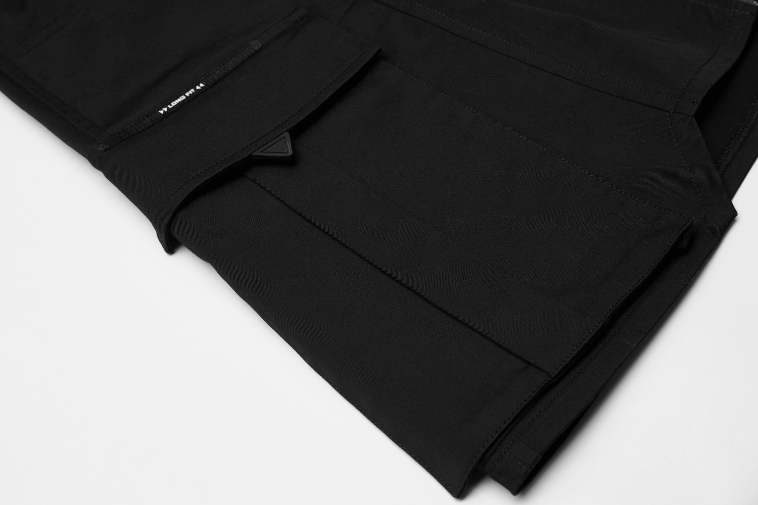 Close-up of the black high-waisted tactical skirt showcasing asymmetrical pockets and sleek fabric texture.