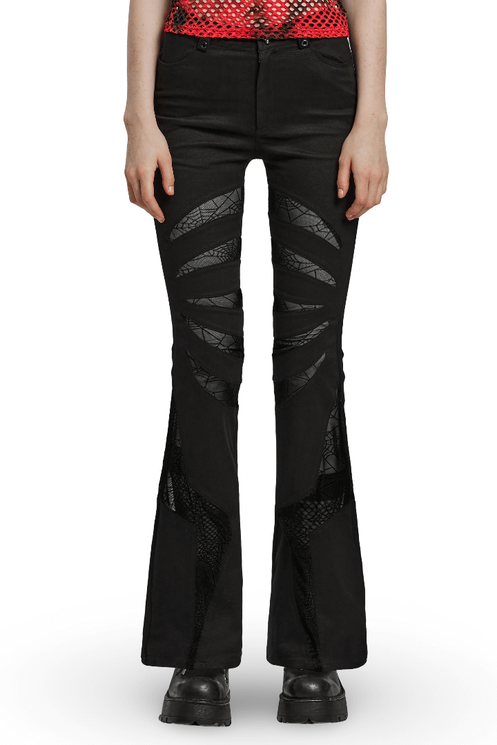 Gothic black flared pants with spiderweb mesh details and a skull accent button for a unique style.