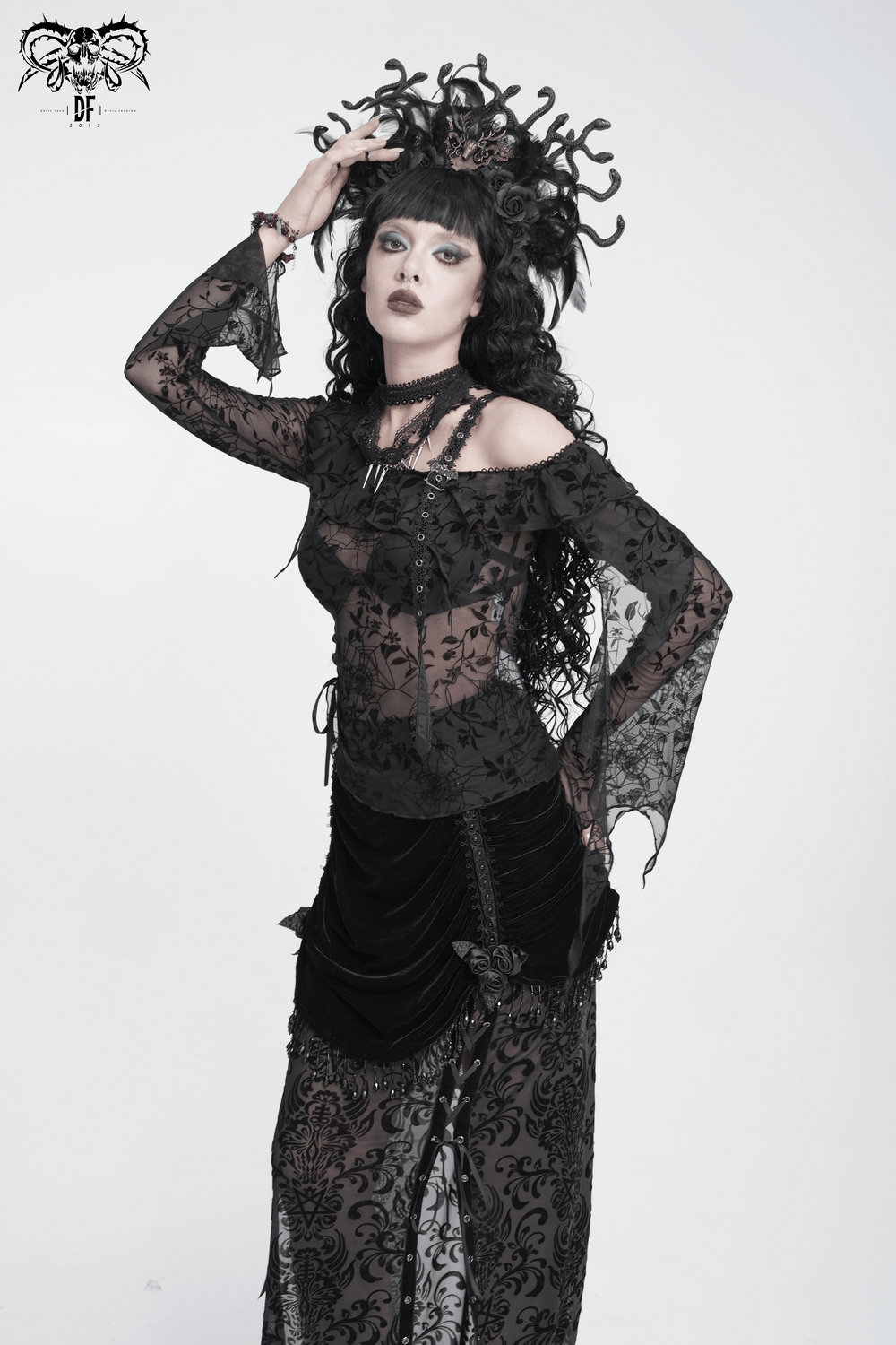 Striking Lace Choker Necklace with Spikes and Cross Charms worn by a model in gothic attire.