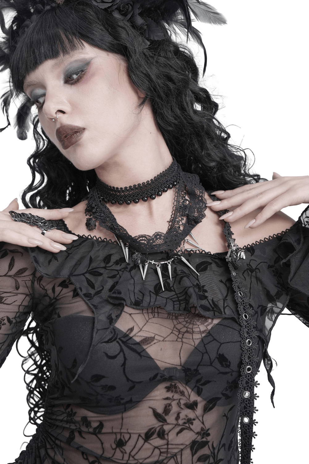 Striking Lace Choker Necklace with Spikes and Cross Charms worn by model in gothic attire.