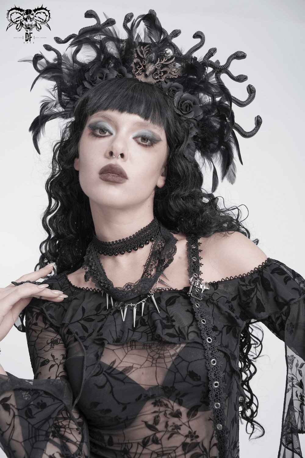 Striking Lace Choker Necklace with Spikes and Cross Charms worn by a model in gothic attire.