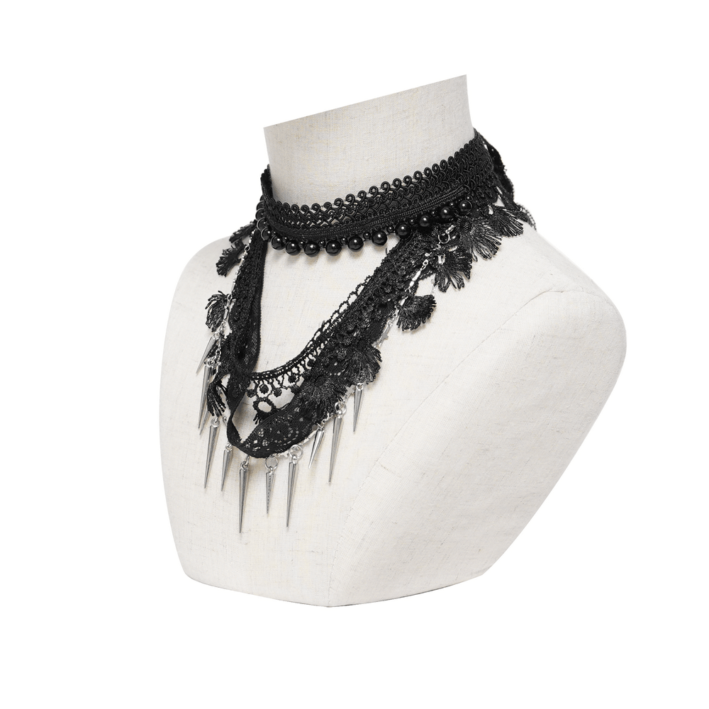 Striking Lace Choker Necklace with Spikes and Cross Charms displayed on a mannequin with layered black lace.