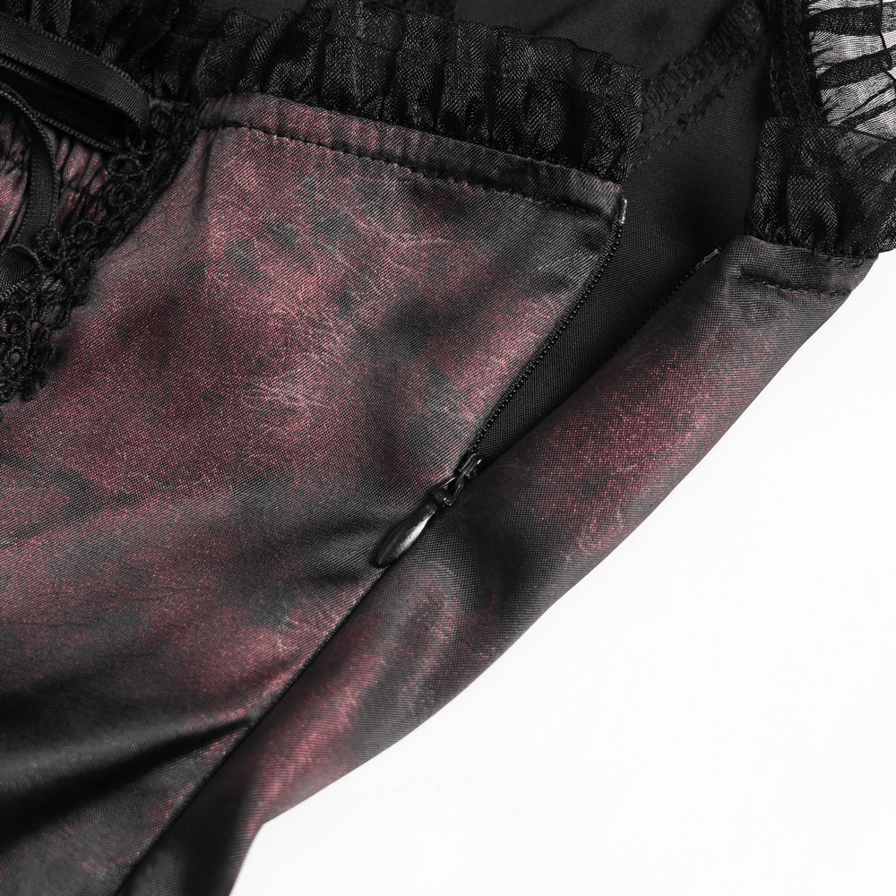 Striking Women's Halter Mini Dress with Corset Lacing Detail showing dark marbled fabric, lace trim, and zipper.