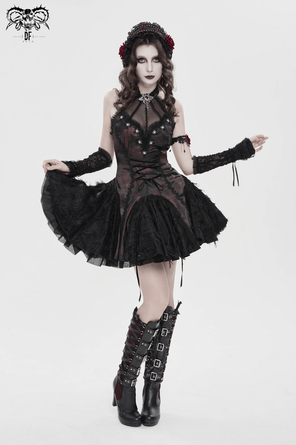 Striking Women's Halter Mini Dress with Corset Lacing Detail worn by model, showcasing gothic style and unique lace accents.