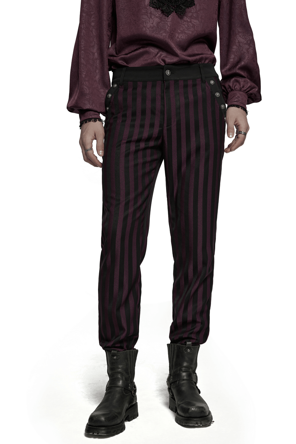 Striped black and burgundy slim gothic trousers, stylishly paired with a purple top and black boots.