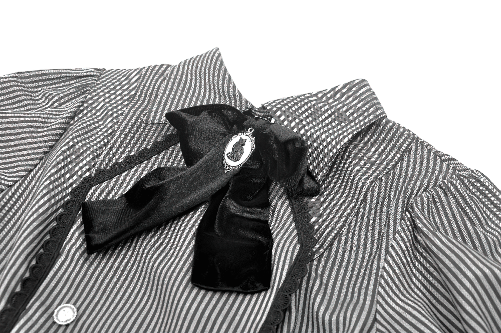 Striped Gothic blouse featuring a dramatic bow and lace trim for a Victorian-inspired look.