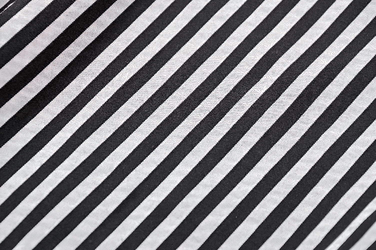 Striped black and white fabric texture perfect for gothic fashion pieces like blouses and dresses.