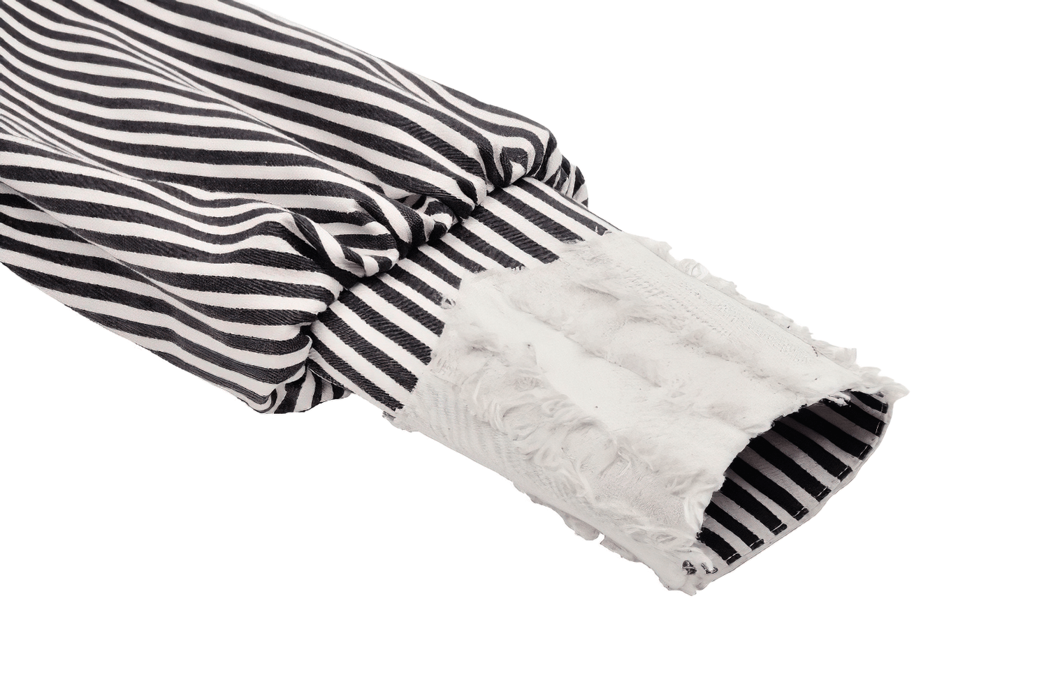 Close-up of striped Gothic Lolita crop top puff sleeve detail in black and beige with frayed edges.