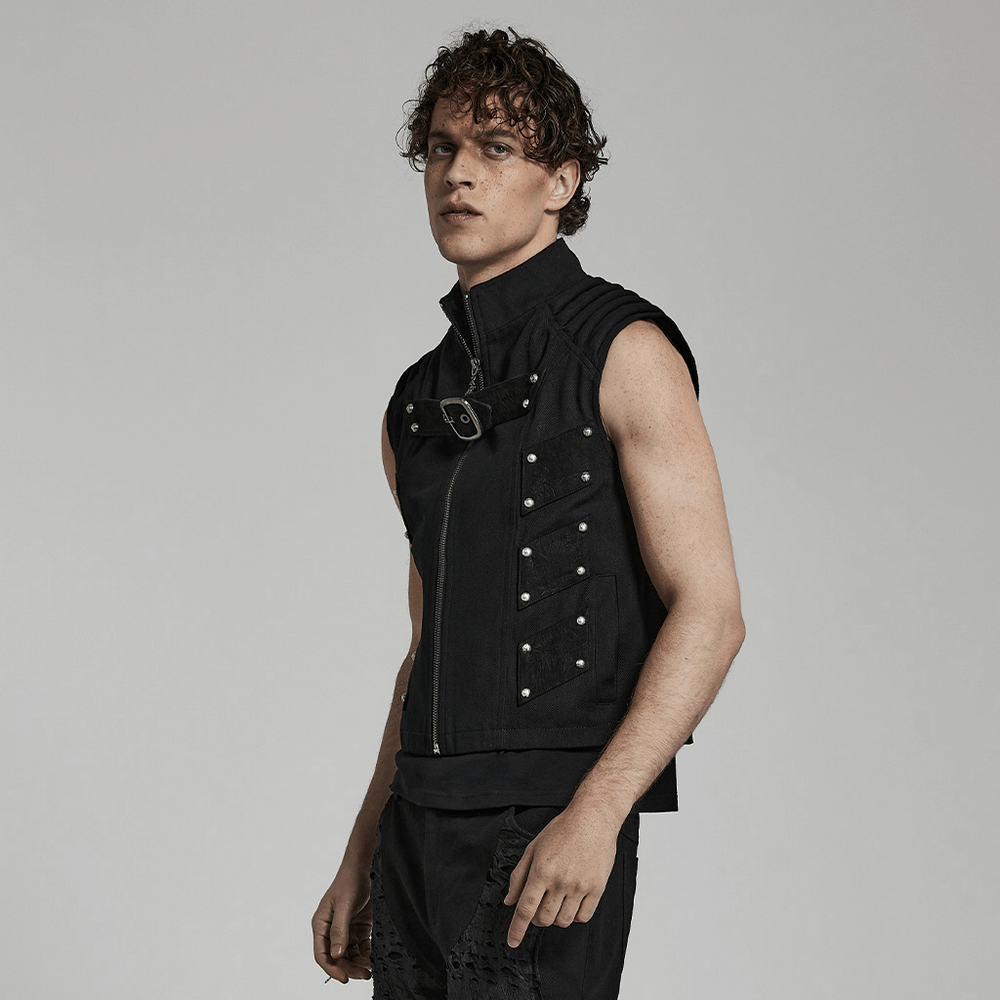 Edgy model showcasing the Studded Black Punk Vest, highlighting its urban gothic style and textured design.