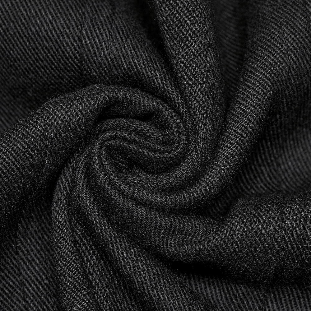 Close-up of luxurious black twill fabric, showcasing its soft texture and elegant weave, perfect for chic urban styles.
