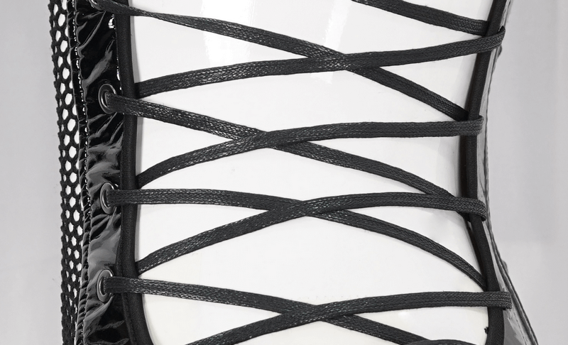 Close-up of the lacing detail on a studded patent leather bodysuit, highlighting punk-inspired design and mesh accents.