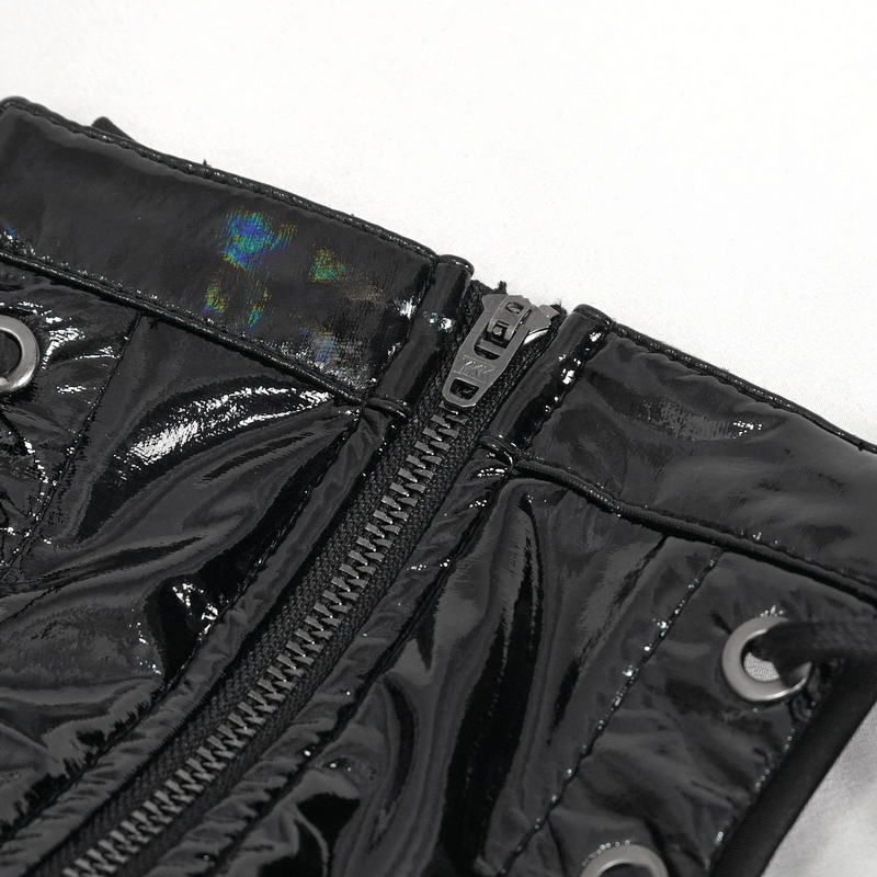 Close-up of the shiny zipper detail on a sexy studded patent leather bodysuit for women.