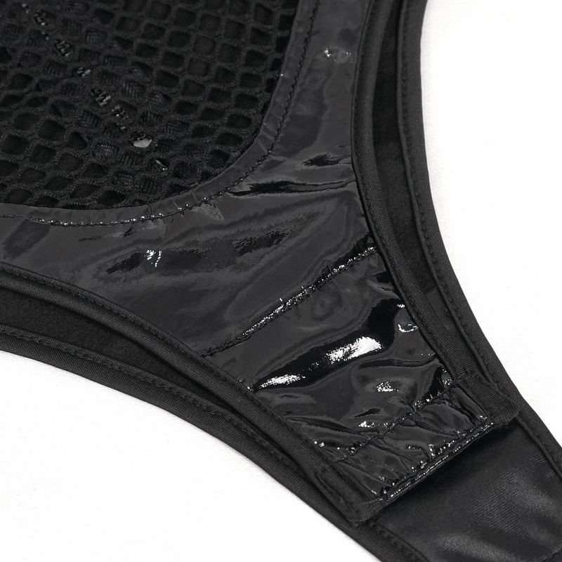 Close-up of a studded mesh splice patent leather bodysuit, showcasing shiny black material and edgy design details.