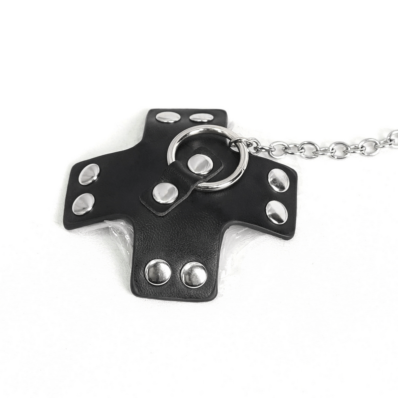 Edgy black leather cross accessory with studs and metal chain for punk-inspired fashion.