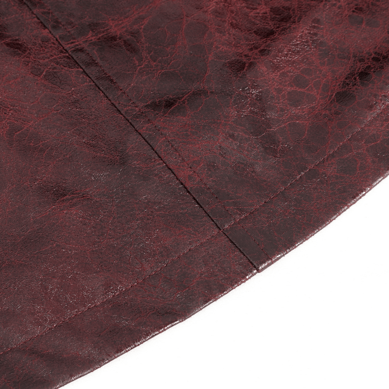 Close-up of rich burgundy faux leather texture highlighting intricate details of a stylish trench coat.