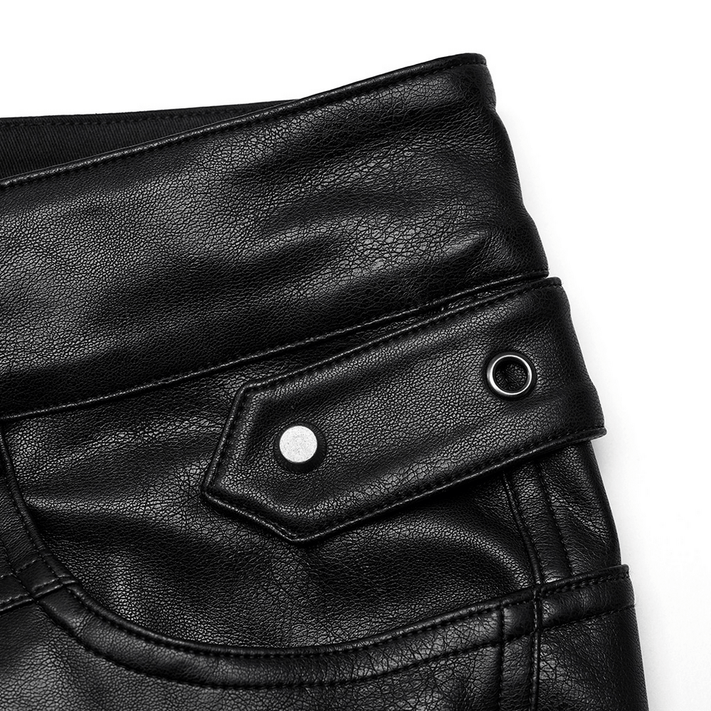 Close-up of black studded PU punk rocker pants with side button detail and textured leather finish.